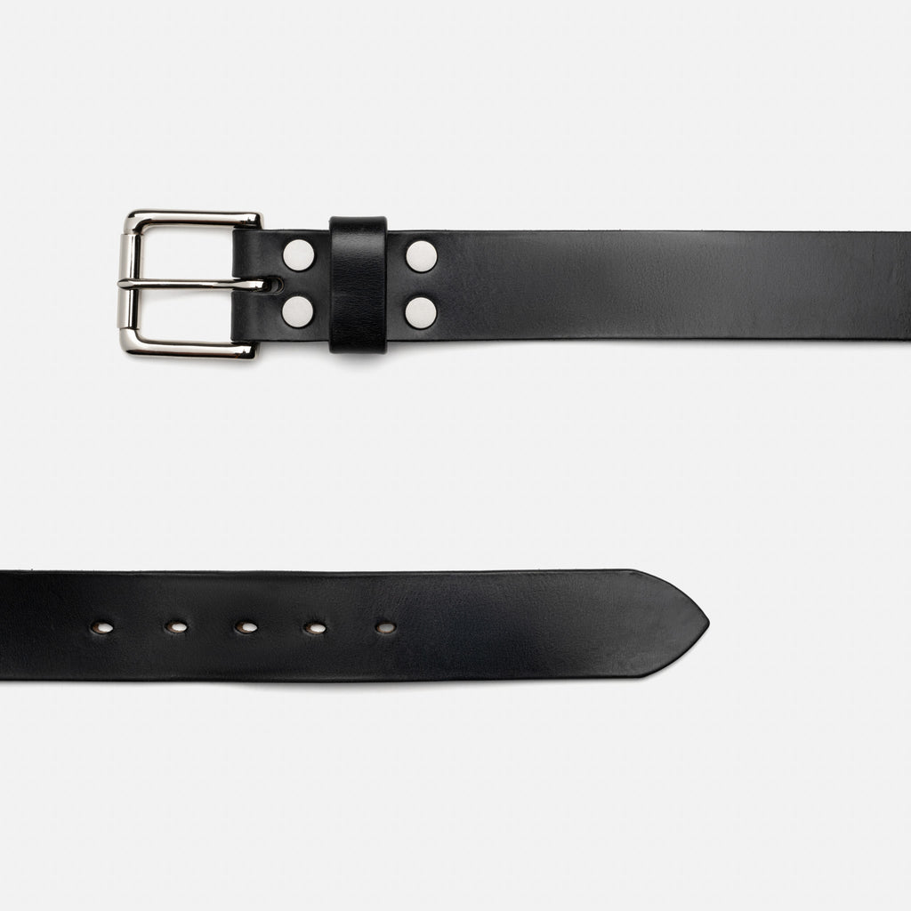 Black leather belt with silver buckle on a white background